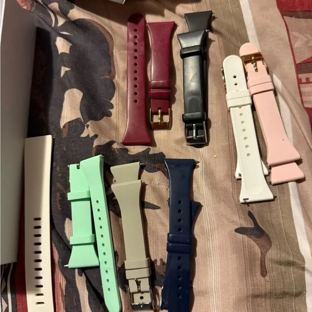 Pair of Fitbit Versa and Fitbit Versa 2, 2 chargers, 2 screen protectors, bands